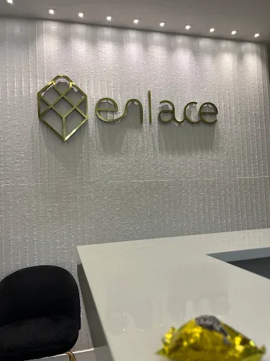 Logo da Enlace Odontologia no espaço de atendimento